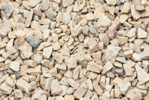 istock Drainage systems from small pebbles. Garden drainage for plants and trees. 1167309225
