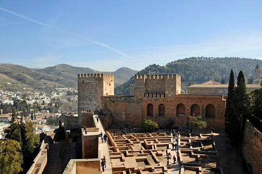 View of the Alhambra between houses in the Albaicín neighborhood. Granada.