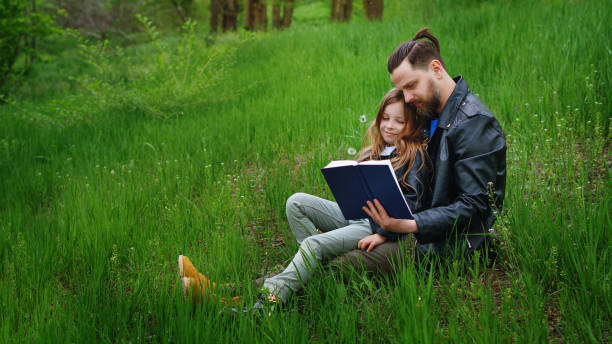 istock Dad and daughter spend time together in park 1167316934
