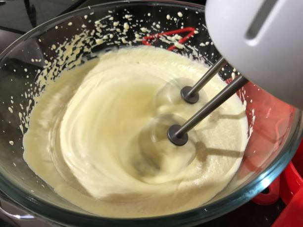 istock Mixing ingredients with blender in a bowl 1167321658
