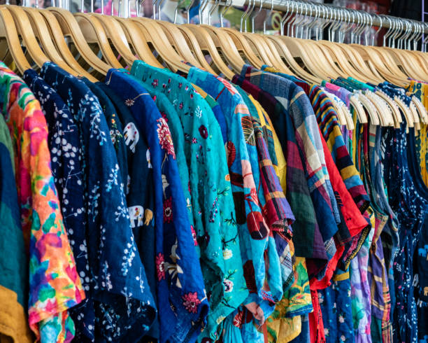 istock Colorful row of clothes on hangers 1167331393