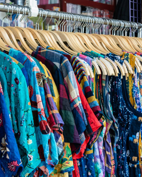 istock Colorful row of clothes on hangers 1167331672
