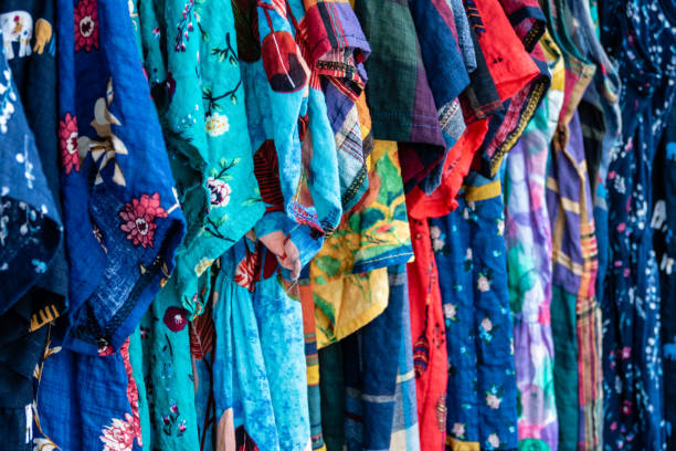 istock Colorful row of clothes on hangers 1167331735