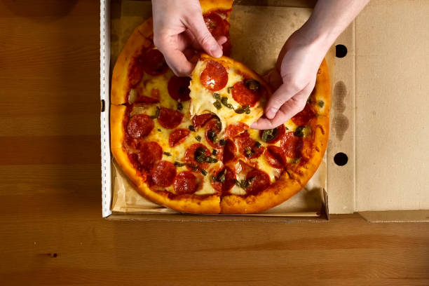 istock Delivered pizza in box, delicious pizza. 1167331789
