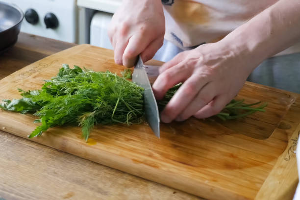 istock Sliced parsley and dill on board. Greens for the second course. 1167332390
