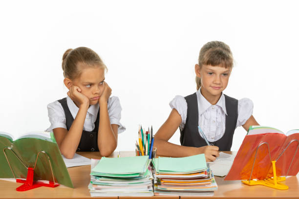 istock Girl hates looking at a classmate 1167332430