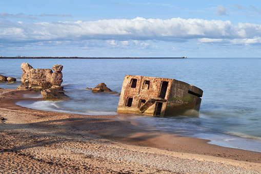 Bunker ruins near the Baltic Sea beach, part of the old fortress in the former Soviet Union base 