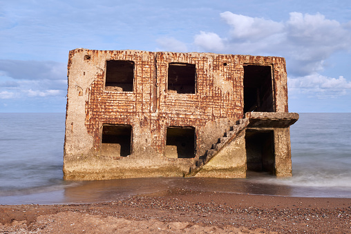 Bunker ruins near the Baltic Sea beach, part of the old fortress in the former Soviet Union base 