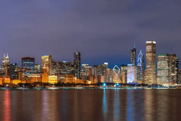 Photo of Chicago Cityscape river side along Lake Michigan at beautiful twilight time, Illinois, United States, Business Architecture and building with tourist concept