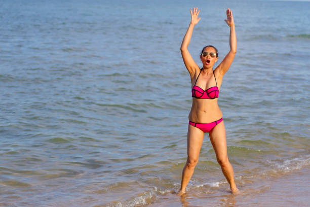 istock Woman and bikini pink show exercise on beach Ban Krut Beach 1167337209