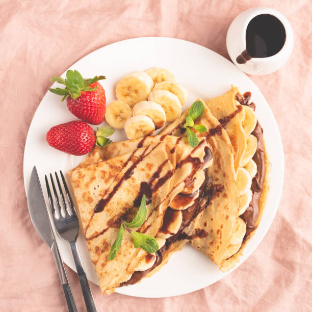 istock French crepe with chocolate and banana on plate 1167343449