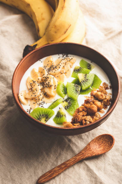 istock Fruit and yogurt bowl with crunchy granola 1167343476