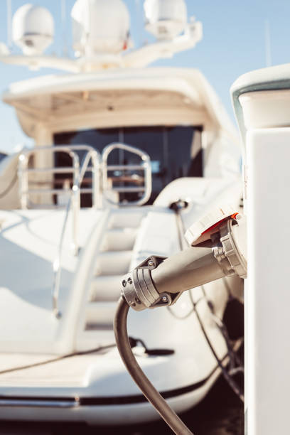 istock Moored yachts charging with fuel and electricity 1167345957