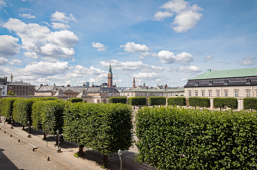 Copenhagen, Denmark - July 17, 2019: View to the tower of the Copenhagen city hall from  the Danish parliament, Christiansborg