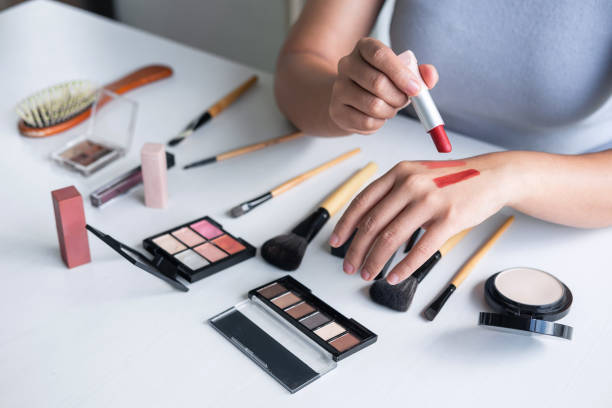 istock Elegant female Beauty blogger showing testing beauty cosmetic using product makeup tutorial cosmetics and sale product 1167347111