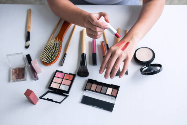 istock Elegant female Beauty blogger showing testing beauty cosmetic using product makeup tutorial cosmetics and sale product 1167347116