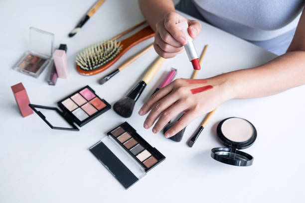 istock Elegant female Beauty blogger showing testing beauty cosmetic using product makeup tutorial cosmetics and sale product 1167347121