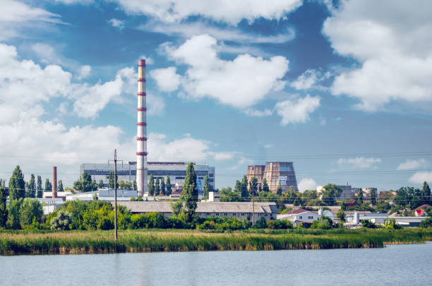 istock Thermal power plant with chimneys, industrial landscape 1167349903
