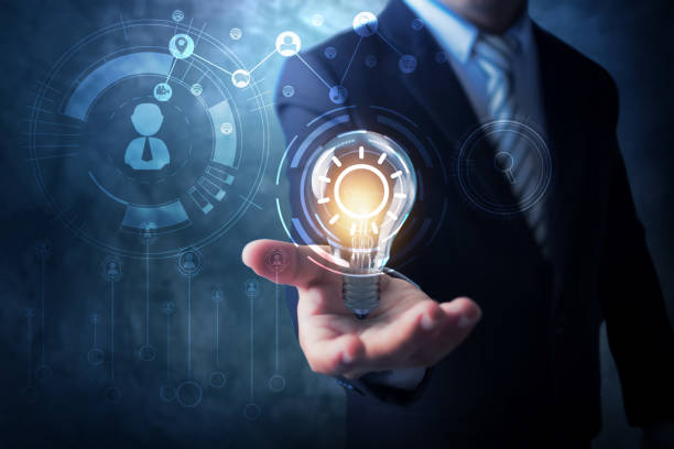 istock innovation and technology concept, businessman holding holding lighting bulb creative with connection line to communicate with internet network display icon, Innovate and develop unlimited people 1167351542