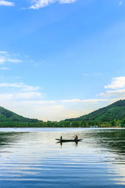 tourists enjoying boating in Dal Lake, Jammu and Kashmir, india