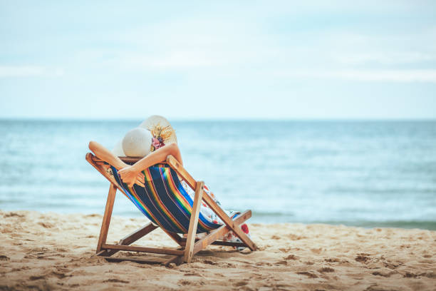 istock Woman on beach in summer 1167356396