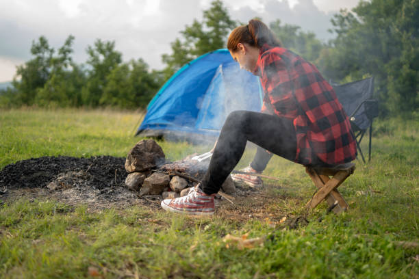istock Young girl preparing food on grill 1167356547