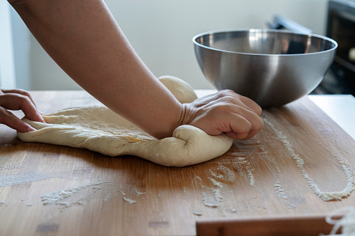 kneading dough with hand