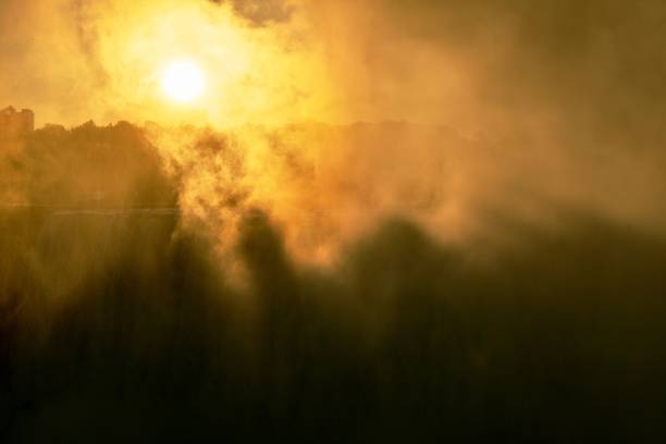 istock The sun attempts to break through the waterfall mist 1167358604