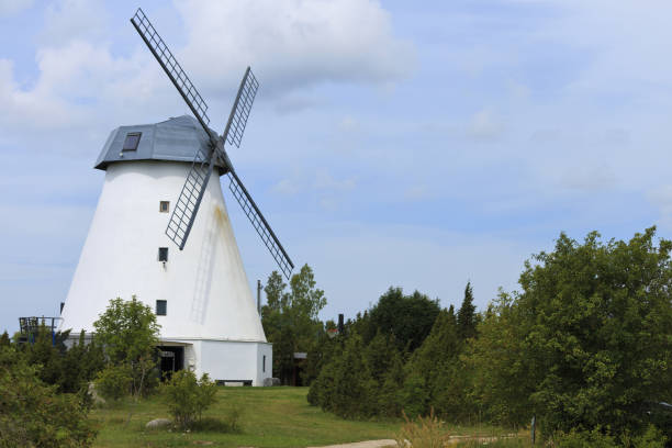 istock Countryside landscape with windmill. 1167364142
