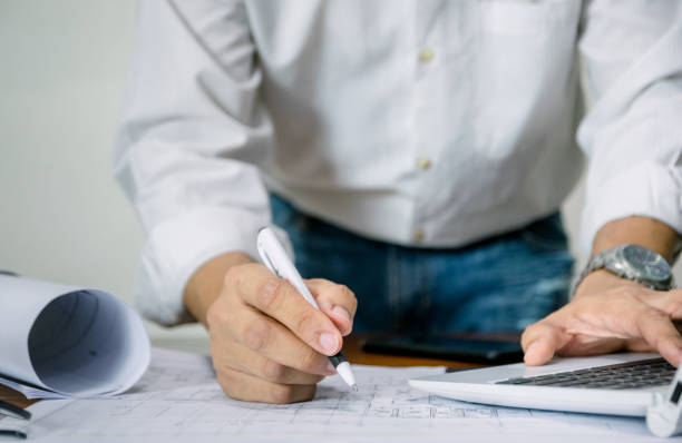 istock Engineer for the design of the plan building 1167364376