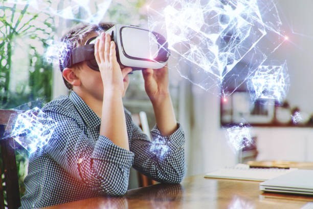 istock A boy in virtual glasses learning geometric shapes holograms. 1167366518