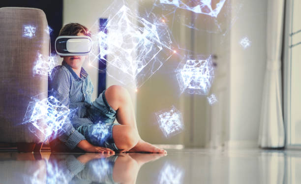 istock A boy in virtual glasses learning geometric shapes holograms. 1167366558