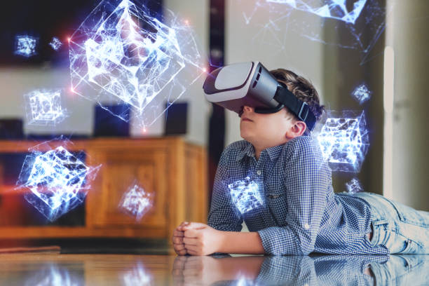 istock A boy in virtual glasses learning geometric shapes holograms. 1167366581