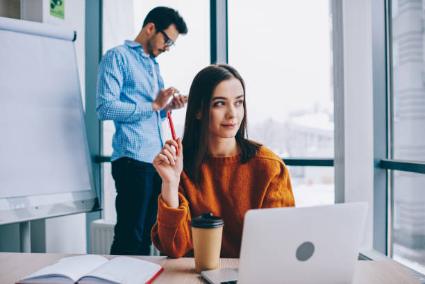 istock Concentrated on work woman thinking about plan for project strategy sitting at desktop with netbook, creative pensive female web designer pondering on ideas during organizing process in office 1167366772
