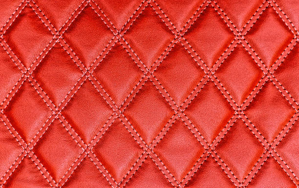 istock Red leather texture with stitched rhombuses 1167370818