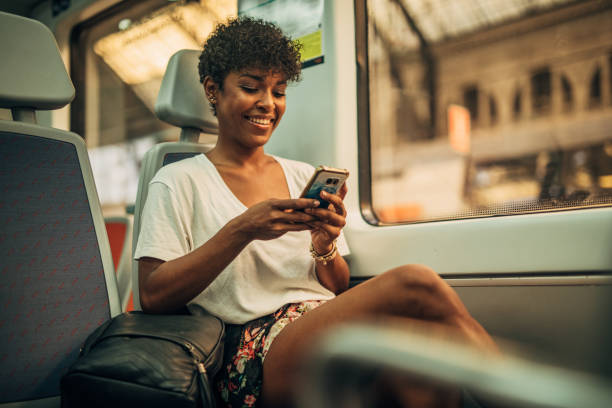 istock Beautiful woman in train 1167375003