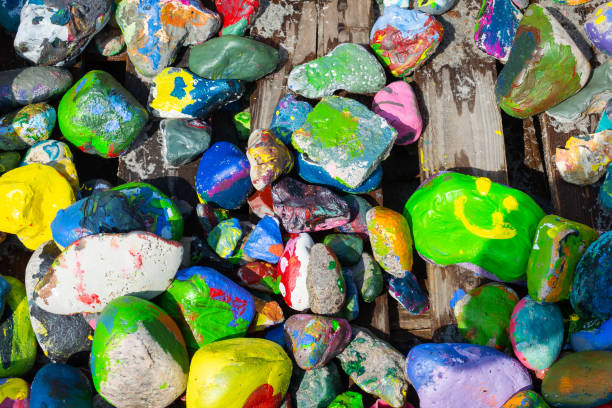 istock Beautiful multi-colored painted sea stones 1167377438