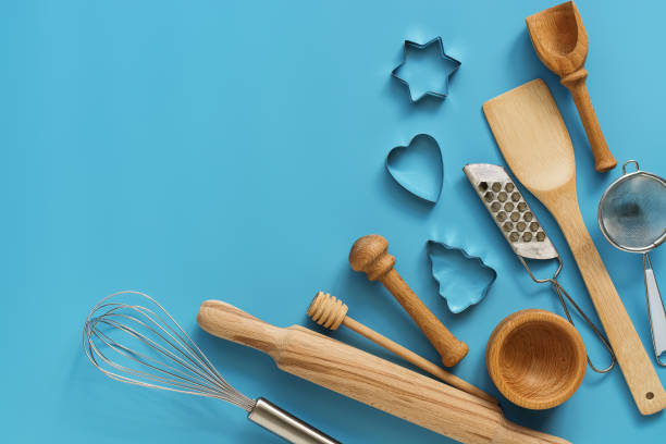 istock Flat lay variety of kitchen utensils for cooking on a blue background. Top view, copy space. 1167377510