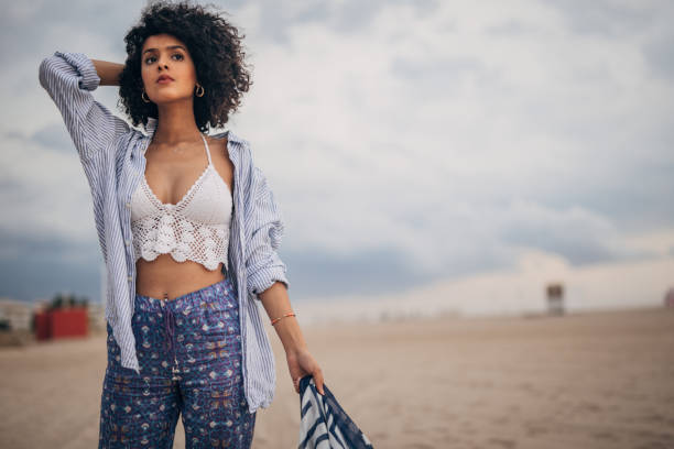istock Woman at the beach 1167378424