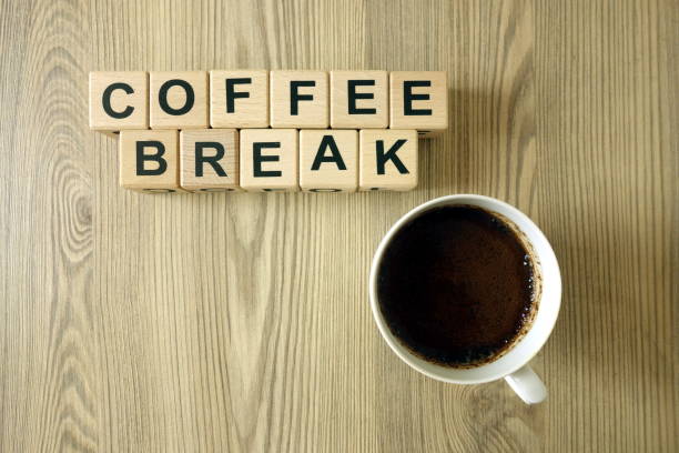 istock Text coffee break and cup of arabica on wooden table 1167382431