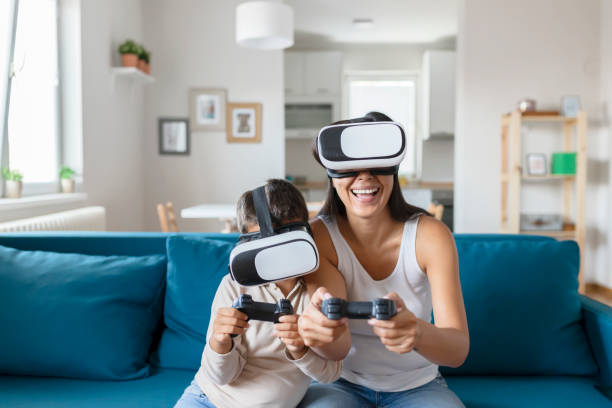 istock Mother and Her Little Son Playing Virtual Reality Headset 1167382784