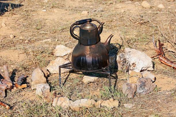 istock A teapot used to cook tea or coffee in a fire 1167383404