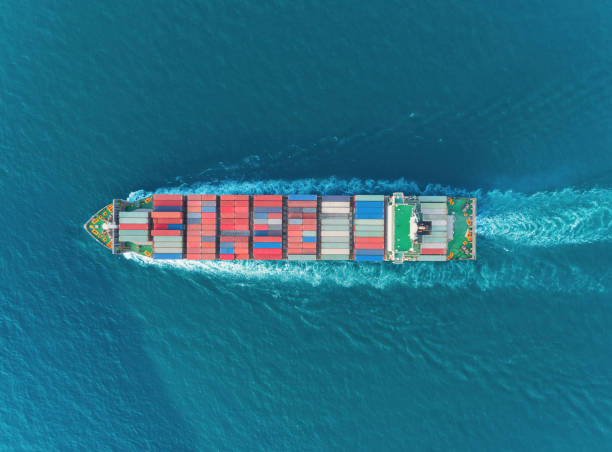 istock Aerial top view container ship on the sea carrier container for logistics, import export, shipping or transportation. 1167383456