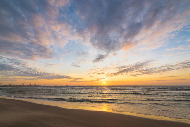 istock Peaceful and colorful sunset over sea 1167387282