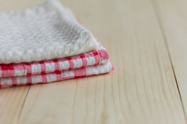 istock stack of kitchen towels on light wooden background 1167387593
