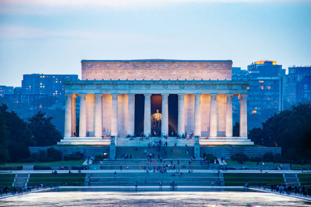 istock Lincoln memorial reflected on the reflection pool when dusk at nation mall. 1167392198