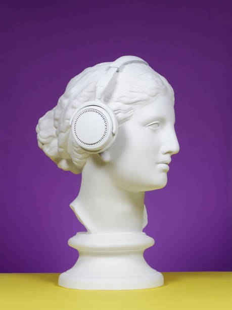 modern greek goddess with headphones - classical greek audio imagens e fotografias de stock