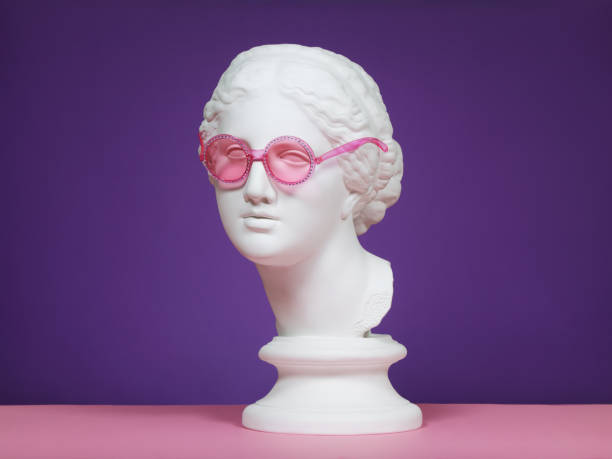 istock Plaster head with pink eyeglasses 1167392615