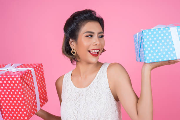 istock Beautiful happy woman with surprise gift box 1167395327