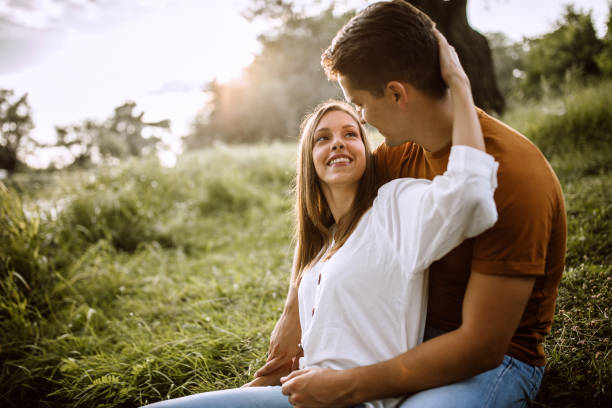istock Romantic couple enjoying on meadow 1167396709
